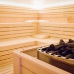 Beautiful sauna interior with heater  and stones