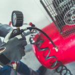 Garage Air Compressor. Adjusting Pressure in a Car Tires.